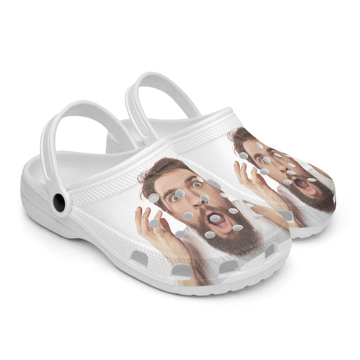 a pair of white shoes with a picture of a bearded man