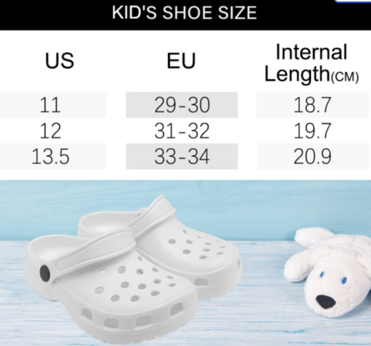 a child's shoe size chart with a stuffed animal next to it