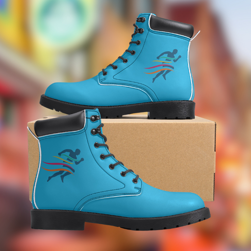 a pair of blue boots sitting on top of a cardboard box